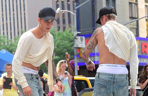 Justin Bieber nửa mặc áo nửa cởi trần, lộ bụng mỡ trên phố