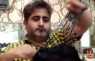 Đến Pakistan xem dịch vụ cắt tóc bằng 15 chiếc kéo cùng một lúc