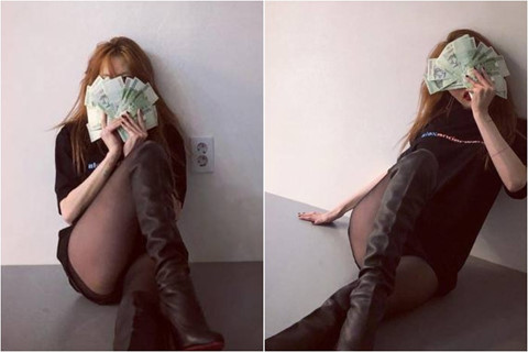 HyunA chỉ mặc quần tất chụp ảnh với xấp tiền bị chê